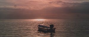 Preview wallpaper sea, boat, sunset, dusk, evening