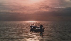 Preview wallpaper sea, boat, sunset, dusk, evening