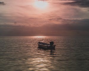 Preview wallpaper sea, boat, sunset, dusk, evening