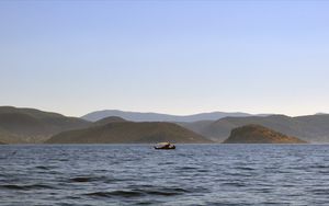 Preview wallpaper sea, boat, water, island, hills