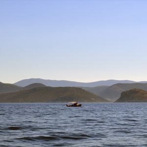 Preview wallpaper sea, boat, water, island, hills