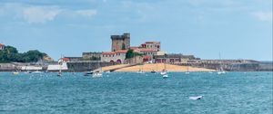 Preview wallpaper sea, boats, island, buildings