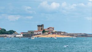 Preview wallpaper sea, boats, island, buildings