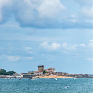 Preview wallpaper sea, boats, island, buildings