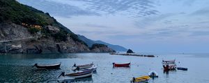 Preview wallpaper sea, boats, rock, island, landscape