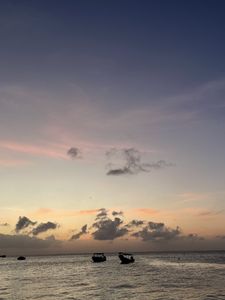 Preview wallpaper sea, boats, silhouettes, sky, dark