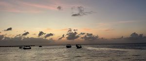 Preview wallpaper sea, boats, silhouettes, sky, dark