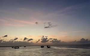 Preview wallpaper sea, boats, silhouettes, sky, dark