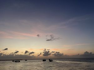 Preview wallpaper sea, boats, silhouettes, sky, dark