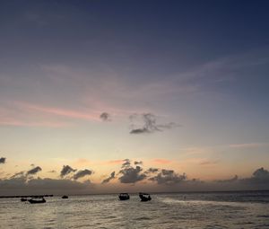 Preview wallpaper sea, boats, silhouettes, sky, dark