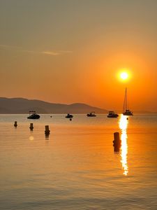 Preview wallpaper sea, boats, sunset, horizon, hills