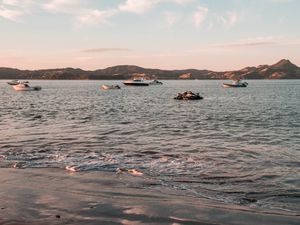 Preview wallpaper sea, boats, water, coast, beach