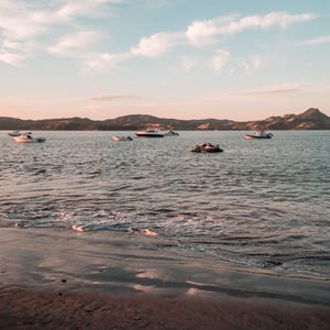 Preview wallpaper sea, boats, water, coast, beach