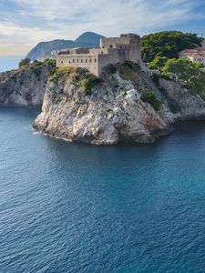 Preview wallpaper sea, buildings, castle, rocks