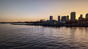 Preview wallpaper sea, buildings, city, pier