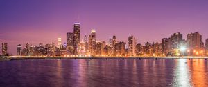 Preview wallpaper sea, buildings, lights, embankment, city, twilight