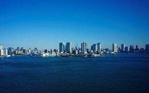 Preview wallpaper sea, buildings, skyscrapers, city, sky, blue