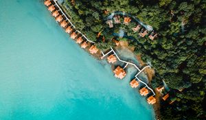 Preview wallpaper sea, bungalow, aerial view, beach, trees