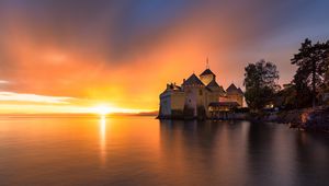 Preview wallpaper sea, castle, sunset, horizon, sky