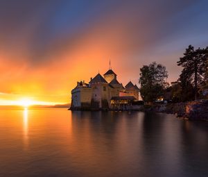 Preview wallpaper sea, castle, sunset, horizon, sky