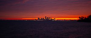 Preview wallpaper sea, city, lights, buildings, dark