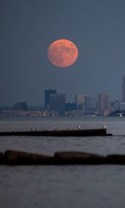 Preview wallpaper sea, city, moon, twilight