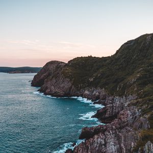 Preview wallpaper sea, cliff, aerial view, rocks, water