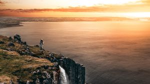 Preview wallpaper sea, cliff, waterfall, sunset, landscape