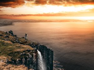 Preview wallpaper sea, cliff, waterfall, sunset, landscape