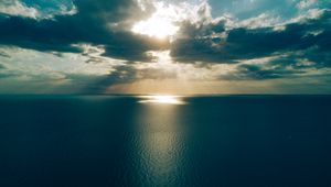 Preview wallpaper sea, clouds, horizon, light, sun, sunset