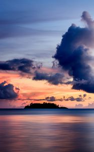 Preview wallpaper sea, clouds, horizon, island, sky, sunset