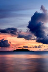 Preview wallpaper sea, clouds, horizon, island, sky, sunset