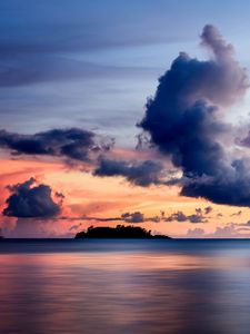 Preview wallpaper sea, clouds, horizon, island, sky, sunset