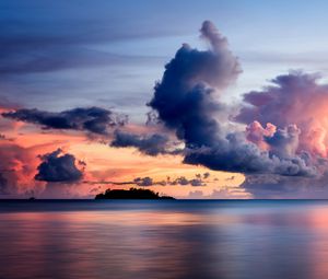 Preview wallpaper sea, clouds, horizon, island, sky, sunset