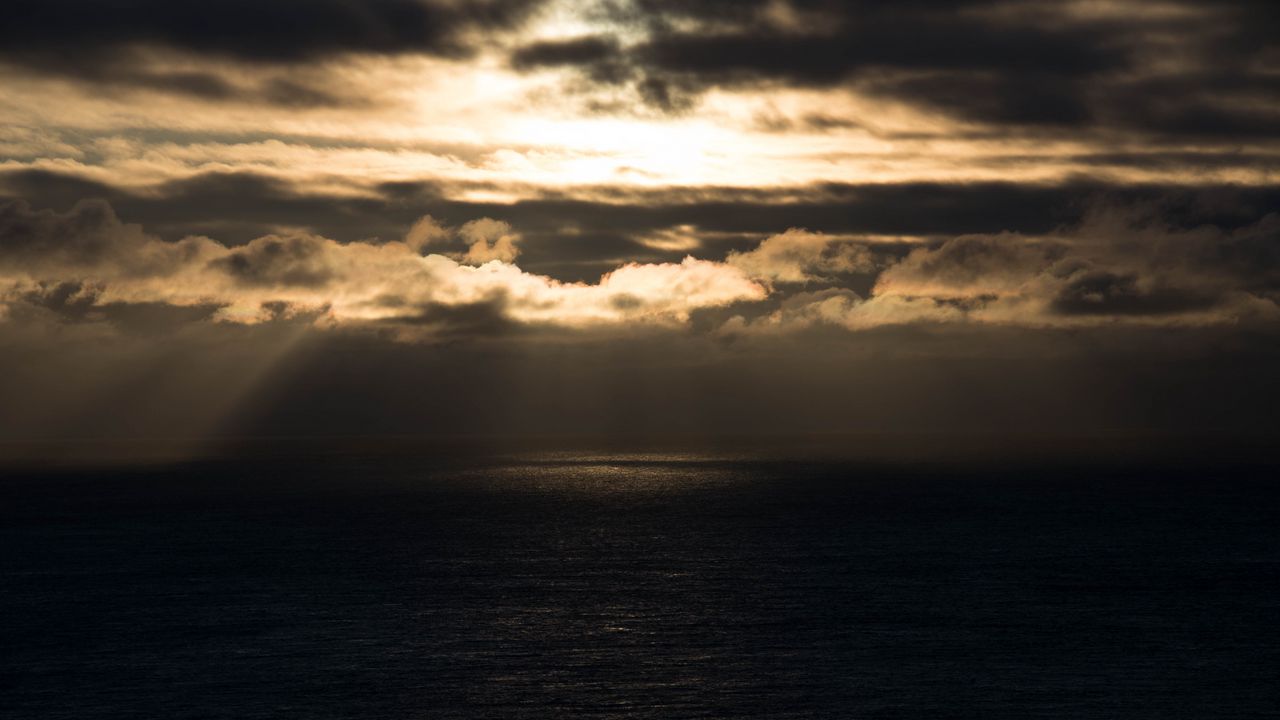 Wallpaper sea, clouds, horizon, dark