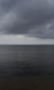 Preview wallpaper sea, clouds, sky, blur, dark