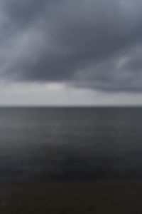 Preview wallpaper sea, clouds, sky, blur, dark