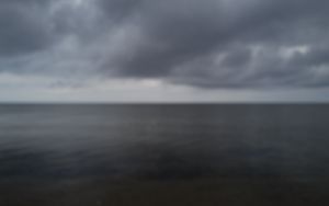 Preview wallpaper sea, clouds, sky, blur, dark