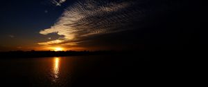Preview wallpaper sea, clouds, sun, sunset, landscape, dark