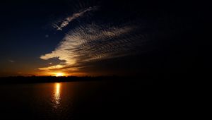 Preview wallpaper sea, clouds, sun, sunset, landscape, dark