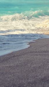 Preview wallpaper sea, coast, beach, sand, wave, stone, macro, grains