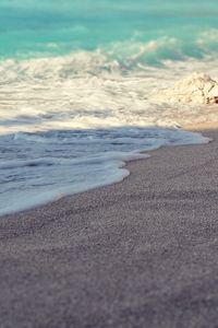 Preview wallpaper sea, coast, beach, sand, wave, stone, macro, grains