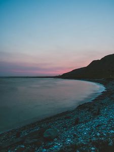 Preview wallpaper sea, coast, hills, dusk, landscape