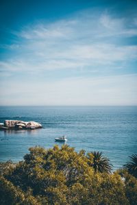 Preview wallpaper sea, coast, horizon, trees, yacht, stones