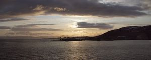 Preview wallpaper sea, coast, island, evening, clouds