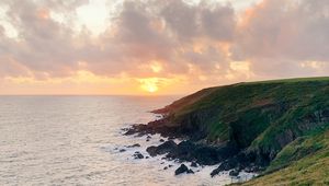 Preview wallpaper sea, coast, path, sunset, landscape
