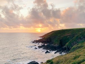 Preview wallpaper sea, coast, path, sunset, landscape