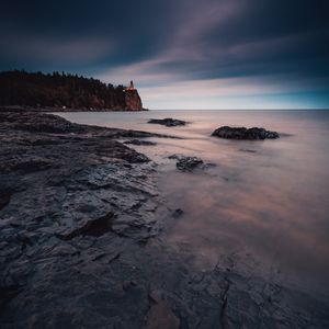 Preview wallpaper sea, coast, rocks, cliff, lighthouse