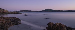 Preview wallpaper sea, coast, rocks, island, dusk