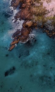 Preview wallpaper sea, coast, sand, stones, rock, nature